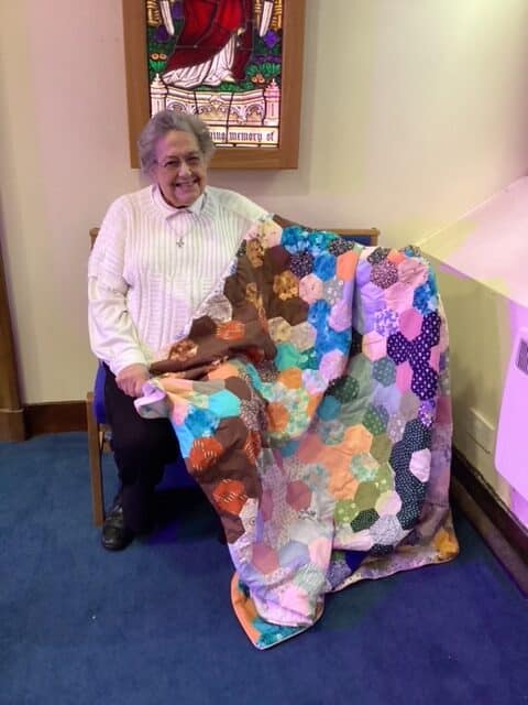 Doreen with her Quilt in Christ Chruch Lanark